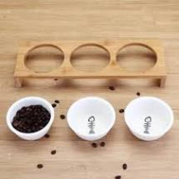 Indiana Dappin Dishes By Three Ceramic Bowls On Wooden Display Platform Indiana Nails
